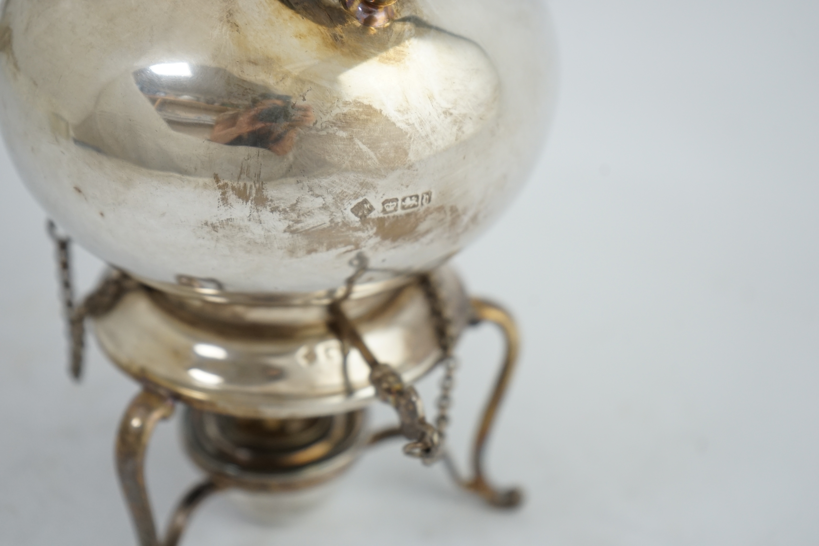 A late Victorian silver bachelor's tea kettle on stand with burner, by Martin, Hall & Co